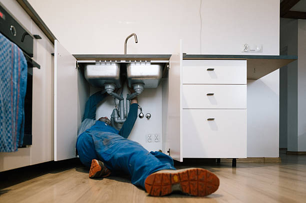 Professional Emergency Plumber technician working in Jensen Beach, FL